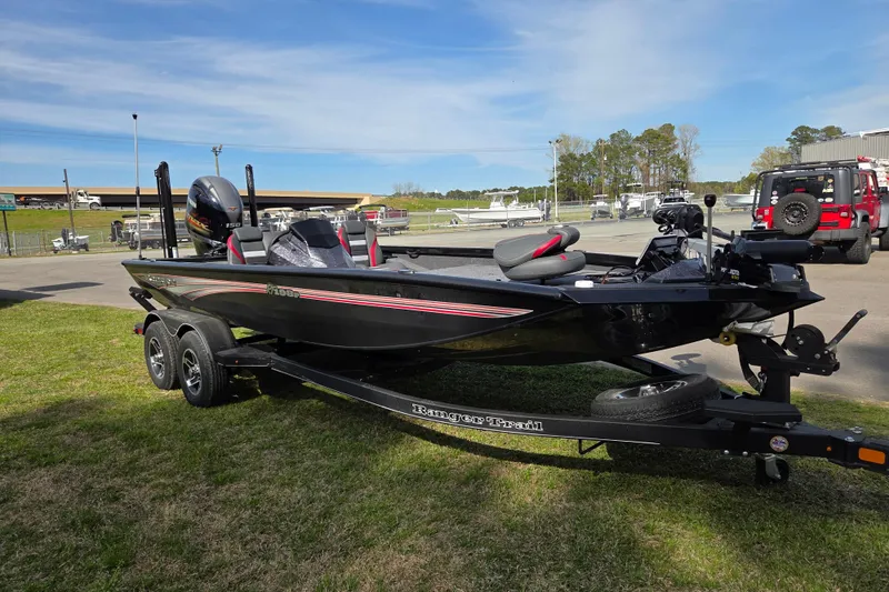 Slide: The Image of 2026 Ranger RT198P boat parked on trailer outdoors. - 6