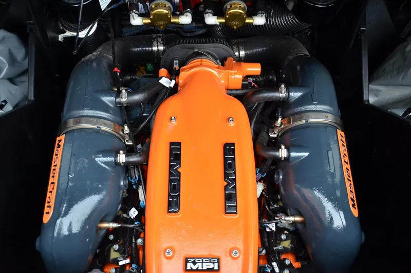 Slide: The Image of Engine of a 2017 MasterCraft X26 boat, featuring Ilmor branding and components. - 15
