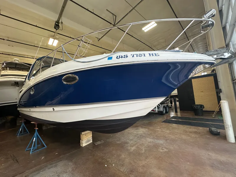 Slide: The Image of 2006 Chaparral 290 Signature boat in storage facility. - 2