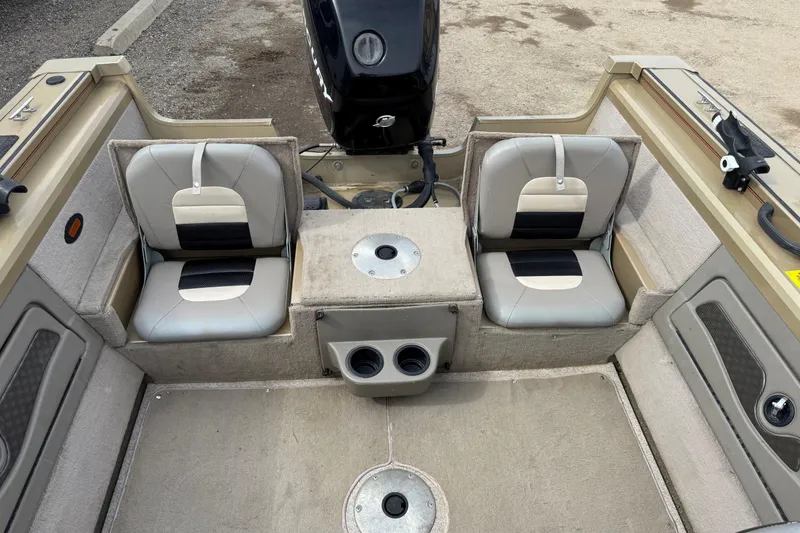 Slide: The Image of 2007 Tracker Targa 175 Sport boat interior with dual seats and motor view. - 12