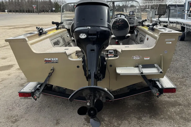 Slide: The Image of 2007 Tracker Targa 175 Sport boat, rear view with motor and interior details. - 5
