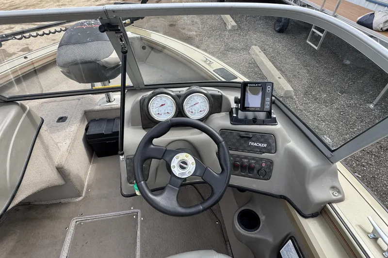 Slide: The Image of 2007 Tracker Targa 175 Sport boat dashboard with steering wheel and gauges. - 7