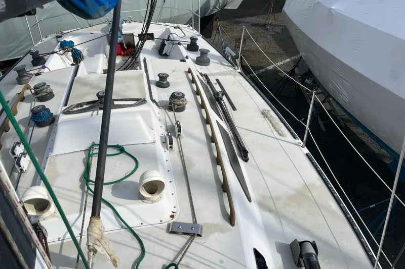 Slide: The Image of 1986 Alsberg Brothers Express 37 sailboat deck with rigging and equipment. - 11