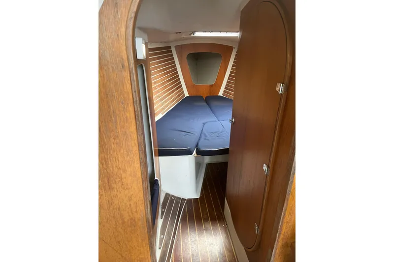 Slide: The Image of Interior cabin of 1986 Alsberg Brothers Express 37 sailboat with wooden finish. - 16