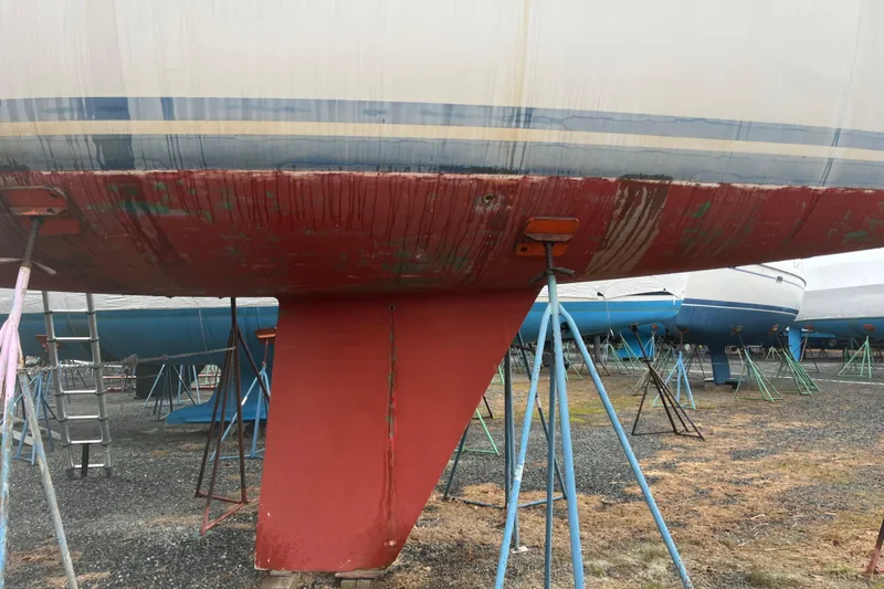 Slide: The Image of 1986 Alsberg Brothers Express 37 sailboat hull on stands in a boatyard. - 30