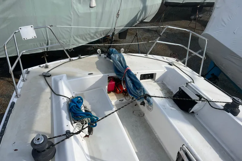 Slide: The Image of Cockpit of 1986 Alsberg Brothers Express 37 sailboat with ropes and equipment. - 32