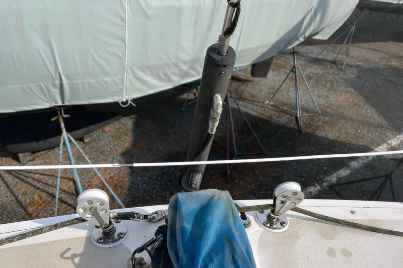 Slide: The Image of Deck view of a 1986 Alsberg Brothers Express 37 sailboat with rigging details. - 33