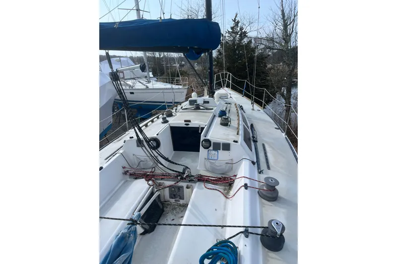 Slide: The Image of 1986 Alsberg Brothers Express 37 sailboat deck with rigging and winches. - 37