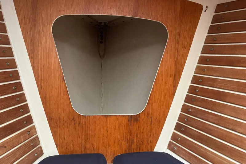 Slide: The Image of Interior view of 1986 Alsberg Brothers Express 37 sailboat with wooden paneling. - 41