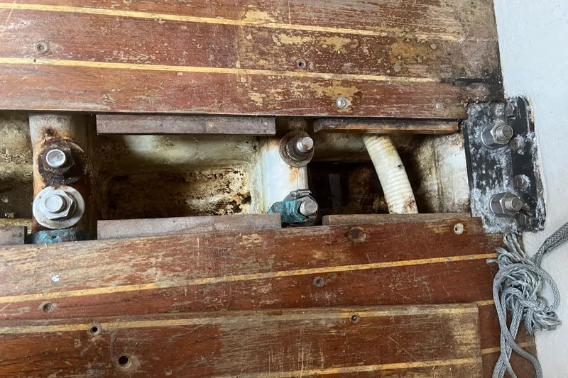 Slide: The Image of Close-up of 1986 Alsberg Brothers Express 37 sailboat's wooden deck and metal fittings. - 63