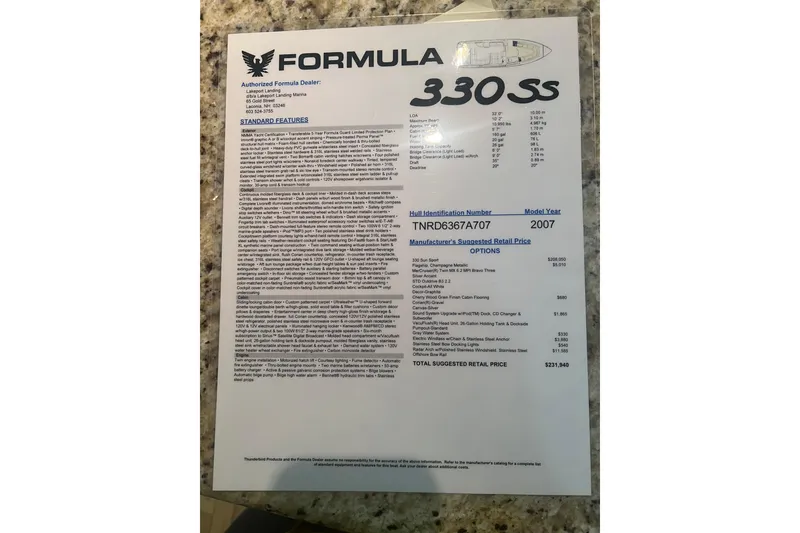 Slide: The Image of 2007 Formula 330 Sun Sport specifications sheet on a granite surface. - 13