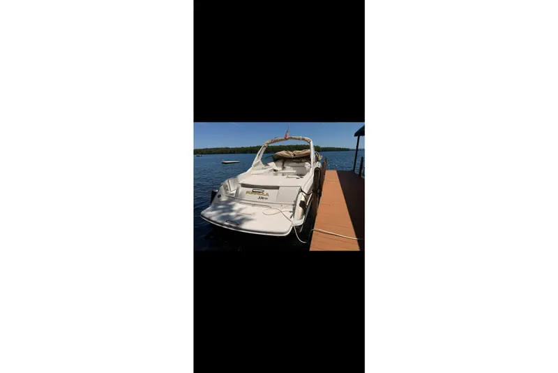 Slide: The Image of 2007 Formula 330 Sun Sport boat docked on a sunny lake. - 14