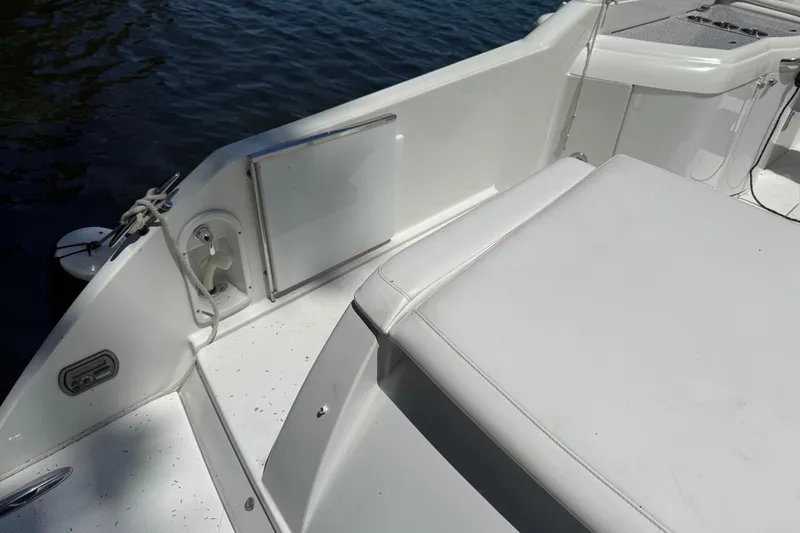 Slide: The Image of 2007 Formula 330 Sun Sport boat interior with white seating and deck details. - 3
