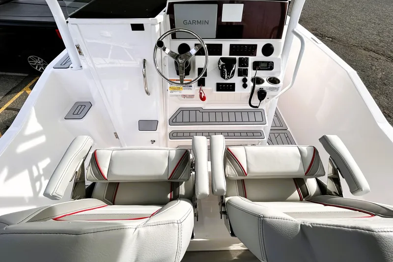 Slide: The Image of Interior view of 2025 Solara S-250 CW boat cockpit with modern controls and seating. - 19