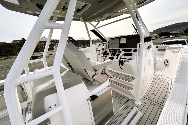 Slide: The Image of 2025 Solara S-250 CW boat cockpit with modern controls and seating. - 21