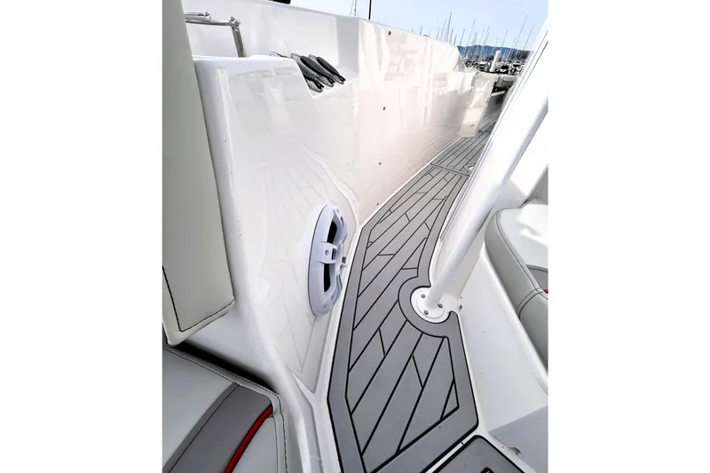 Slide: The Image of 2025 Solara S-250 CW boat deck with sleek design and modern flooring. - 27