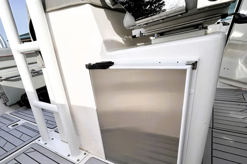 Slide: The Image of 2025 Solara S-250 CW boat interior with sleek storage compartment and modern design. - 31