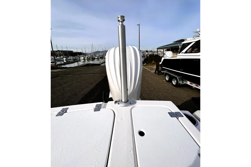 Slide: The Image of 2025 Solara S-250 CW boat at marina, showcasing deck and surroundings. - 34