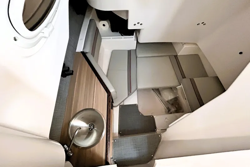 Slide: The Image of Interior cabin of 2025 Solara S-250 CW boat with seating and sink. - 38