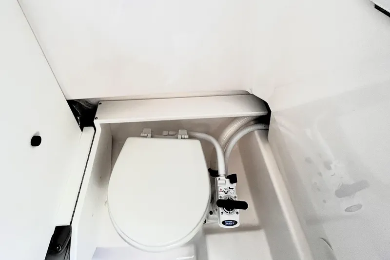 Slide: The Image of Compact marine toilet in 2025 Solara S-250 CW boat bathroom. - 41