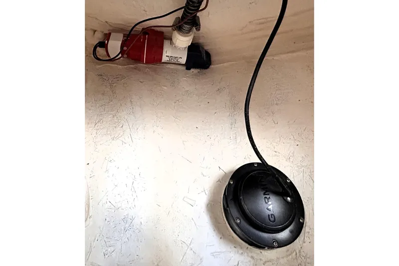 Slide: The Image of Interior view of a 2025 Solara S-250 CW boat featuring a Garmin device and wiring. - 46