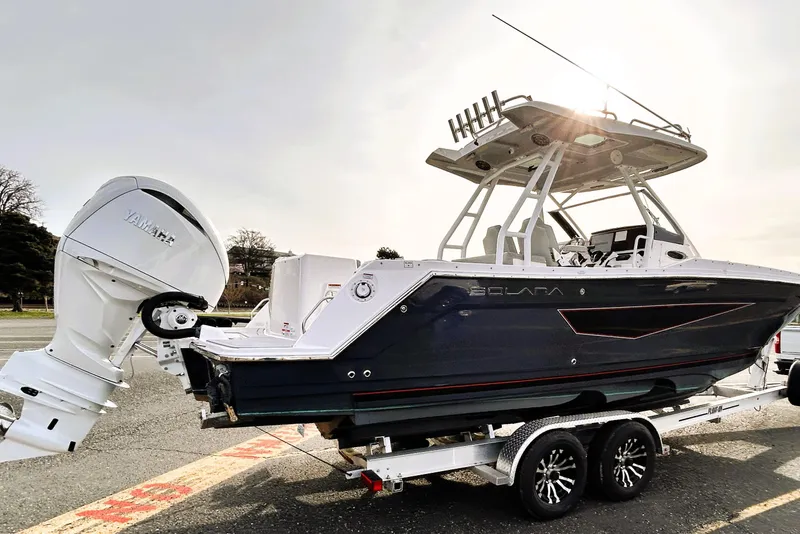 Slide: The Image of 2025 Solara S-250 CW boat on trailer with Yamaha outboard motor. - 7