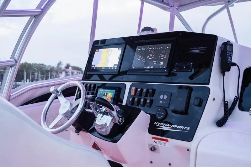 Slide: The Image of Helm of 2006 Hydra-Sports Vector 3300 VX with advanced navigation displays. - 7