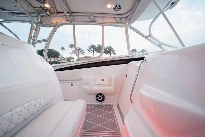 Slide: The Image of 2006 Hydra-Sports Vector 3300 VX boat interior with white seating and modern design. - 8