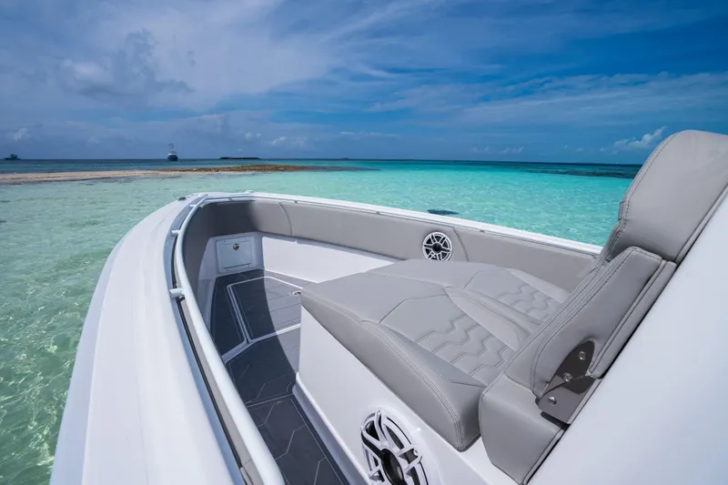 Slide: The Image of Modern Dynamic D-250DF boat on clear turquoise water, 2026 model. - 16