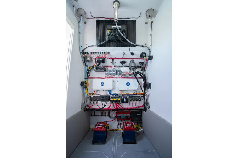 Slide: The Image of Electrical panel setup in Dynamic D-250DF, 2026 model, featuring organized wiring and components. - 19