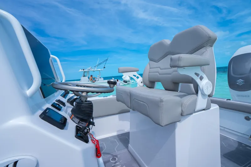 Slide: The Image of Modern Dynamic D-250DF boat interior with steering wheel, luxurious seating, and ocean view, 2026 model. - 22