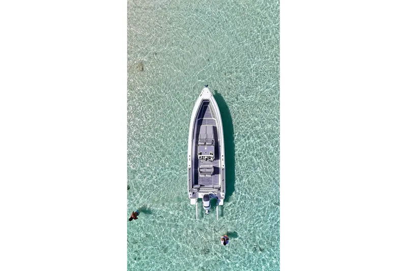 Slide: The Image of Aerial view of Dynamic D-250DF boat on clear turquoise water, 2023 model. - 6