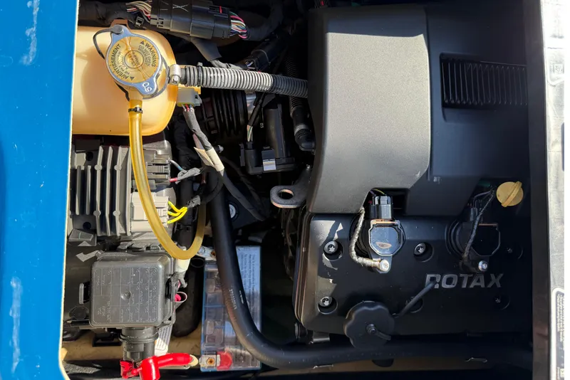 Slide: The Image of 2019 Sea Doo GTX engine compartment with Rotax engine components visible. - 7