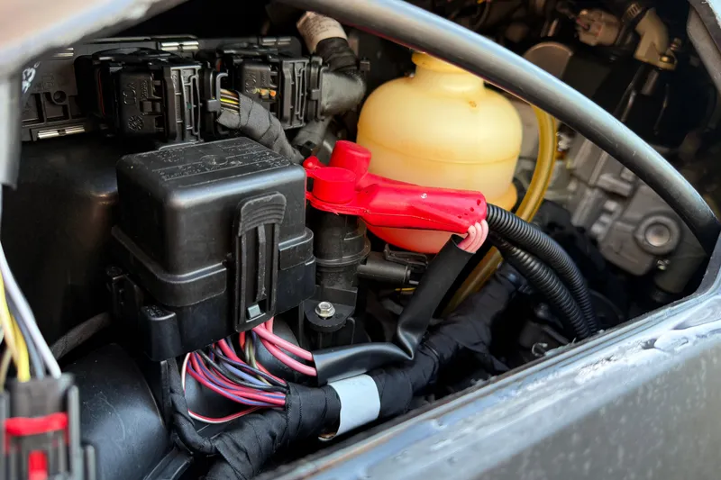 Slide: The Image of 2019 Sea Doo GTX engine compartment with wiring and components visible. - 8