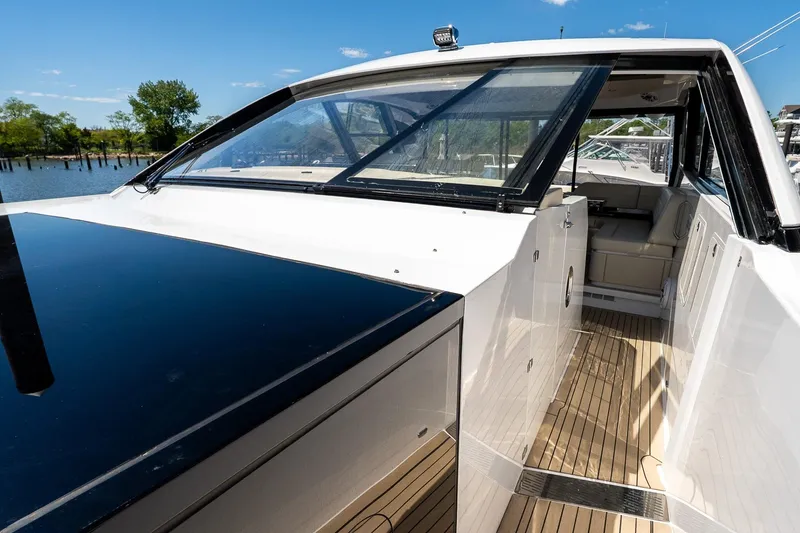 Slide: The Image of 2024 Cruisers Yachts 50 GLS with sleek design and spacious deck. - 26