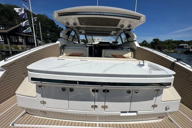 Slide: The Image of 2024 Cruisers Yachts 50 GLS luxury yacht interior with sleek design and modern amenities. - 7