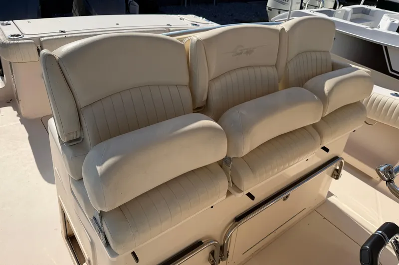 Slide: The Image of Cream-colored seating on a 2010 Grady-White Canyon 336 boat. - 15