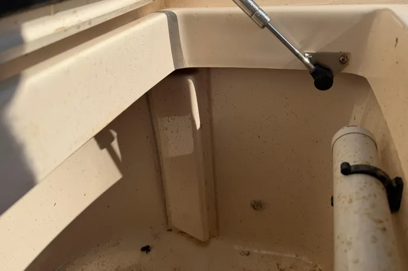 Slide: The Image of Interior view of a 2010 Grady-White Canyon 336 boat compartment with hydraulic support. - 29