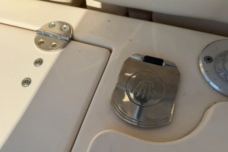 Slide: The Image of Hinged compartment on 2010 Grady-White Canyon 336 boat deck. - 30