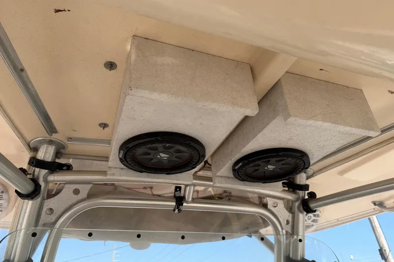Slide: The Image of Speakers installed on a 2010 Grady-White Canyon 336 boat's overhead console. - 41