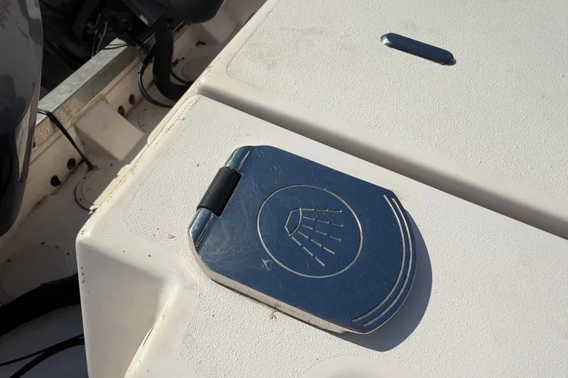 Slide: The Image of 2010 Grady-White Canyon 336 boat deck with metal hatch cover. - 45