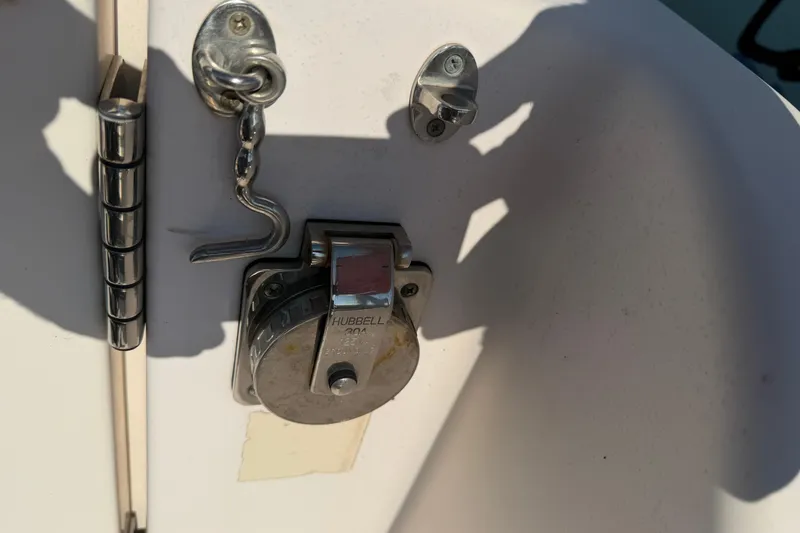 Slide: The Image of Close-up of a Hubbell electrical outlet on a 2010 Grady-White Canyon 336 boat. - 47