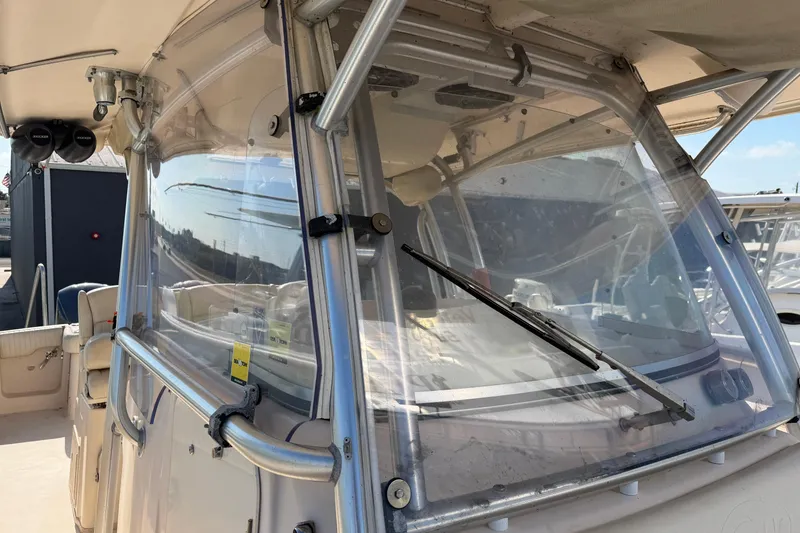 Slide: The Image of 2010 Grady-White Canyon 336 boat with clear windshield and sturdy frame. - 52