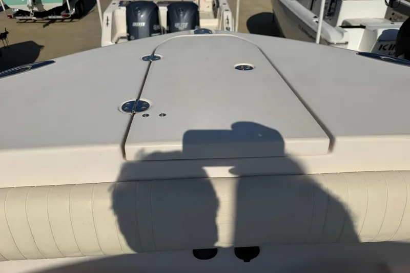 Slide: The Image of 2010 Grady-White Canyon 336 boat deck with dual Yamaha engines in background. - 61