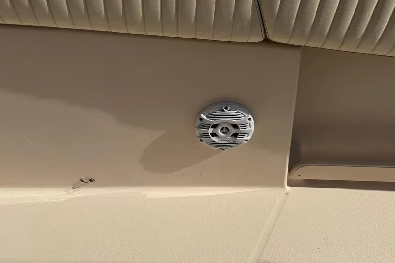Slide: The Image of Kenwood speaker on 2010 Grady-White Canyon 336 boat interior. - 65