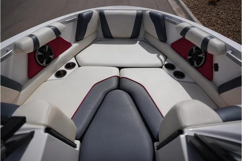 Slide: The Image of Interior of 2018 Malibu Wakesetter 21 VLX with speakers and cup holders. - 10