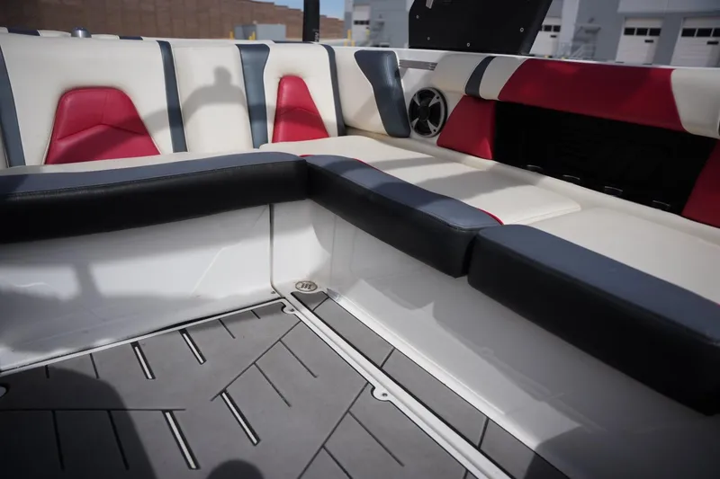 Slide: The Image of Interior of 2018 Malibu Wakesetter 21 VLX with stylish seating. - 14