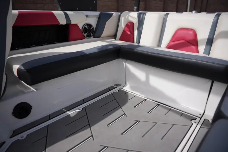 Slide: The Image of Interior of 2018 Malibu Wakesetter 21 VLX with stylish seating. - 15