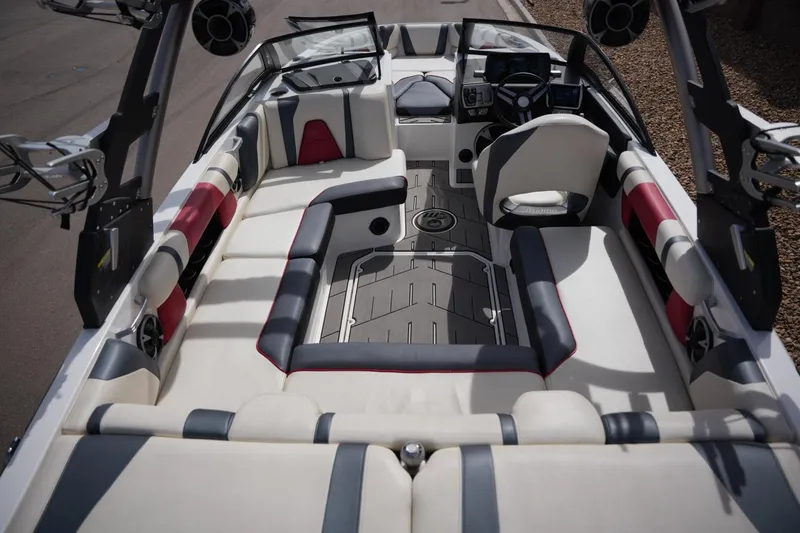 Slide: The Image of Interior of 2018 Malibu Wakesetter 21 VLX with luxurious seating. - 18