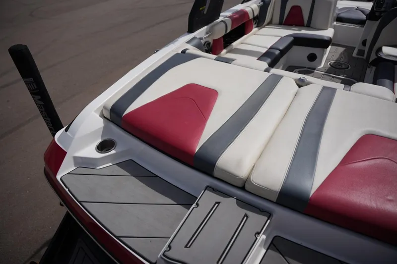 Slide: The Image of Interior of 2018 Malibu Wakesetter 21 VLX with red and gray seating. - 20